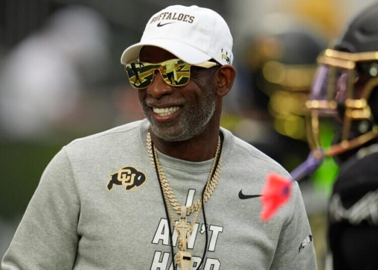 Did Deion Sanders really offer reporters $50,000 not to mention him? Yes, but ‘that was a joke’