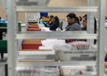 Justice Department can’t threaten election workers to stop processing ballots, judge rules