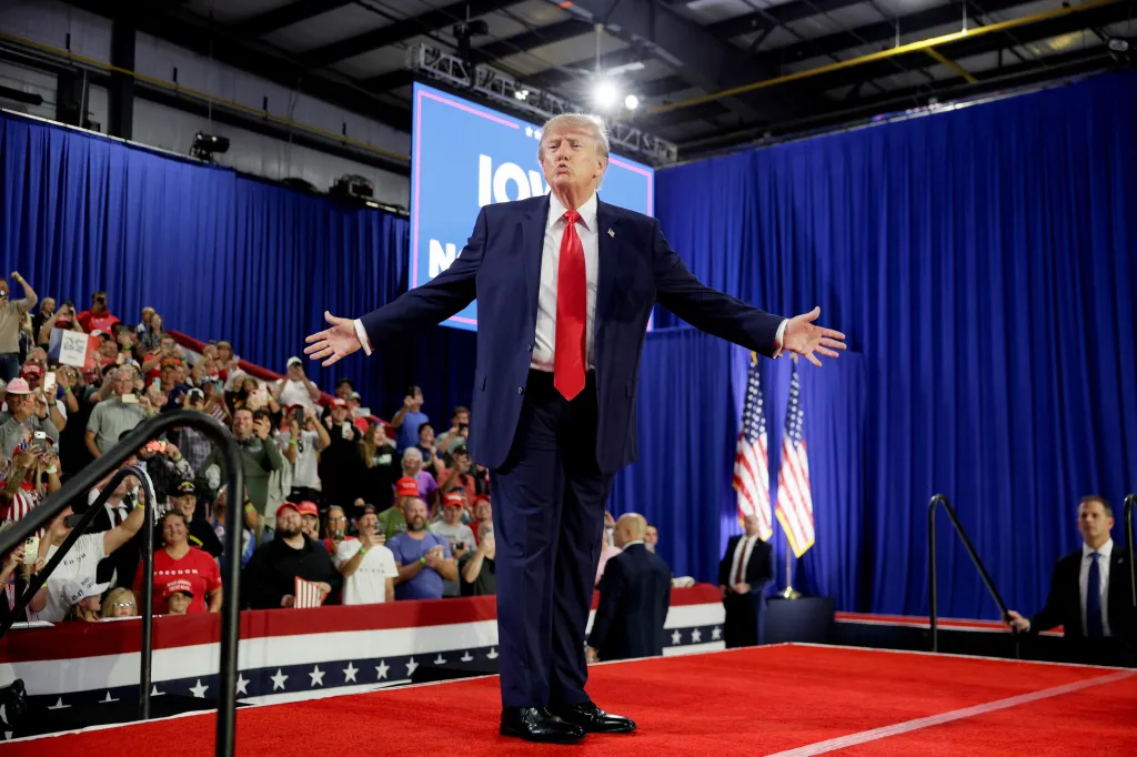U.S. President Donald Trump gestures on stage during a Republican campaign rally in Sioux City, Iowa.