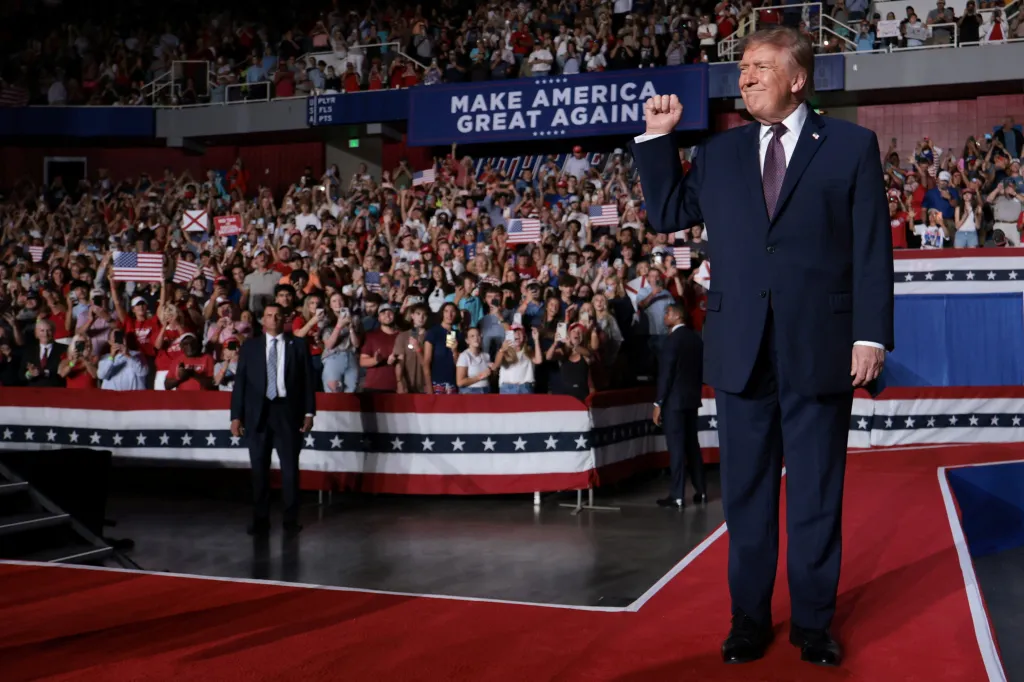 U.S. President Donald Trump raises his fist at a rally ahead of the midterm elections at the University of South Alabama in Mobile, Alabama.