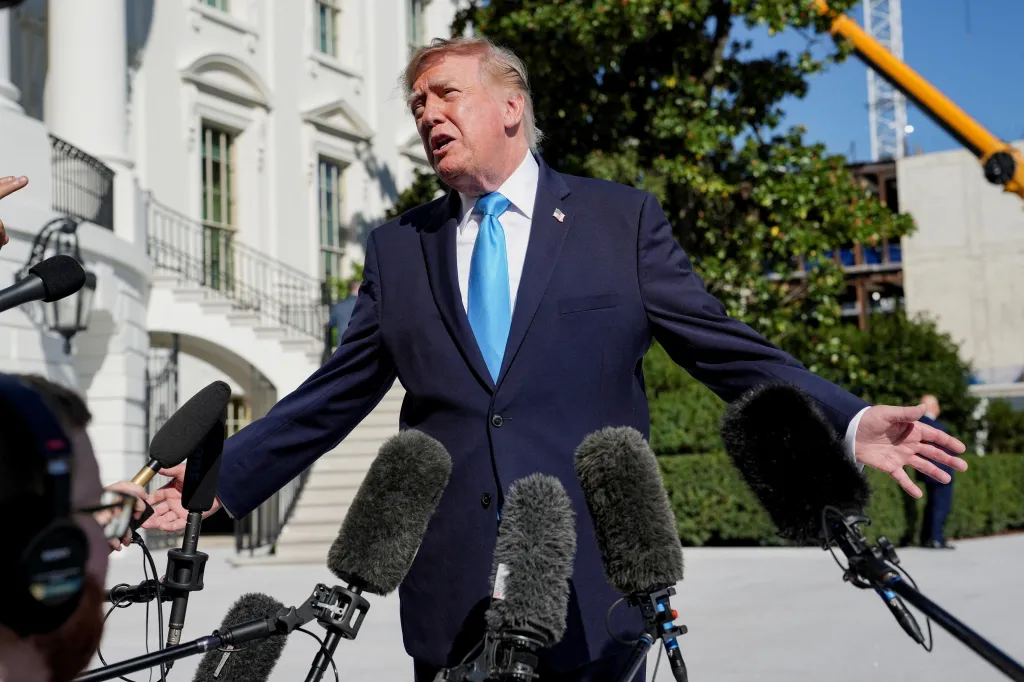 U.S. President Donald Trump speaks with media on the South Lawn of the White House before traveling to Grand Island, Nebraska.