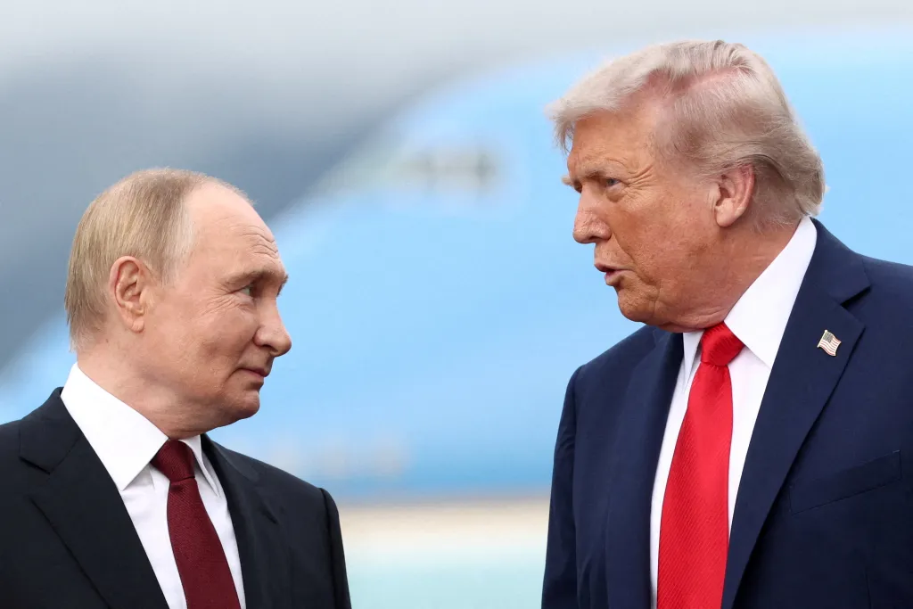 U.S. President Donald Trump speaks with Russian President Vladimir Putin during a meeting in Alaska.