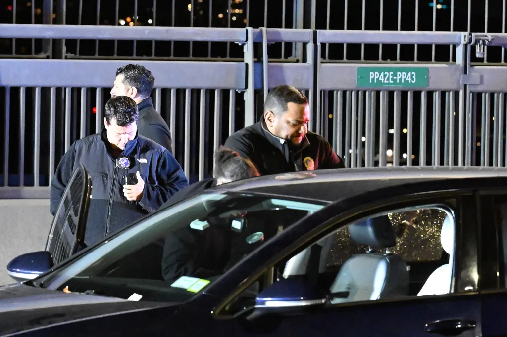 Investigators at the scene of a fatal shooting on the George Washington Bridge.