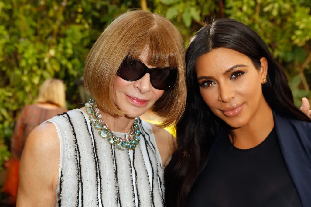Anna Wintour and Kim Kardashian posing together at the CFDA/Vogue Fashion Fund Show and Tea.