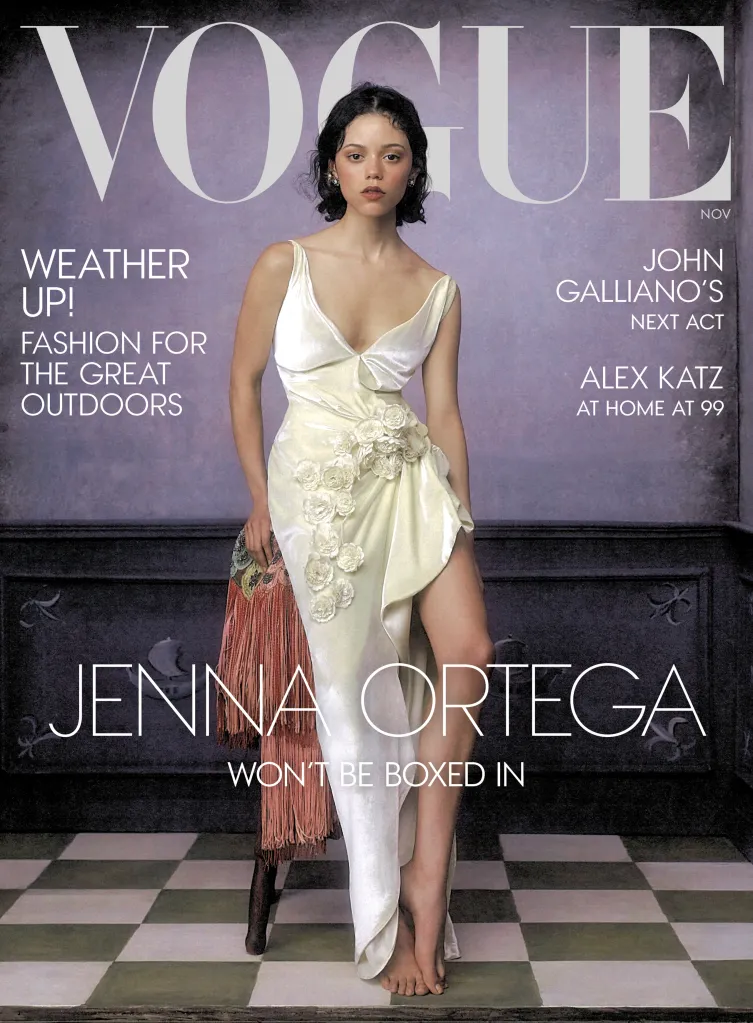 Jenna Ortega on the cover of Vogue, wearing a white satin dress with floral appliqués.