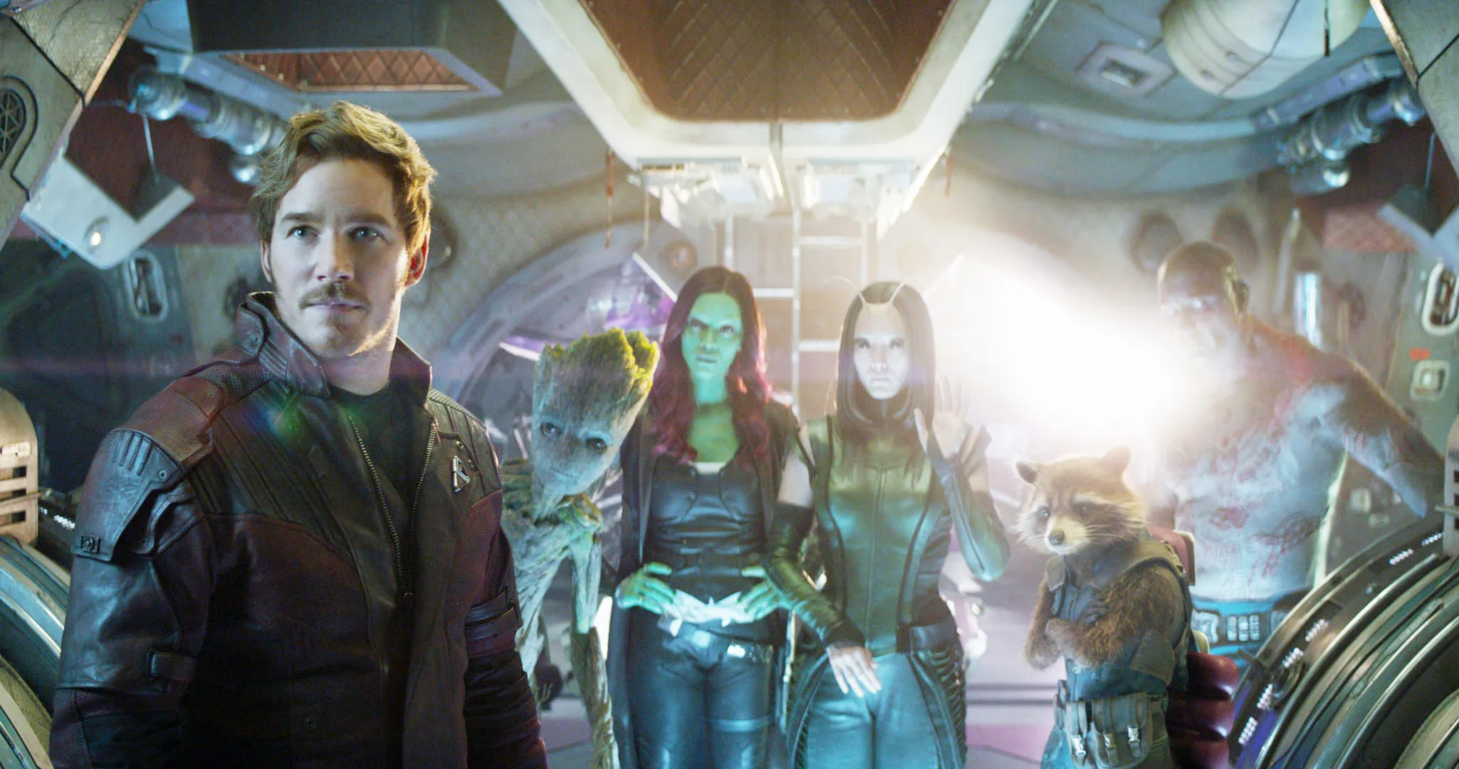 Chris Pratt as Star-Lord, Groot, Zoe Saldana as Gamora, Pom Klementieff as Mantis, Rocket, and Dave Bautista as Drax in a scene from the film Avengers: Infinity War.