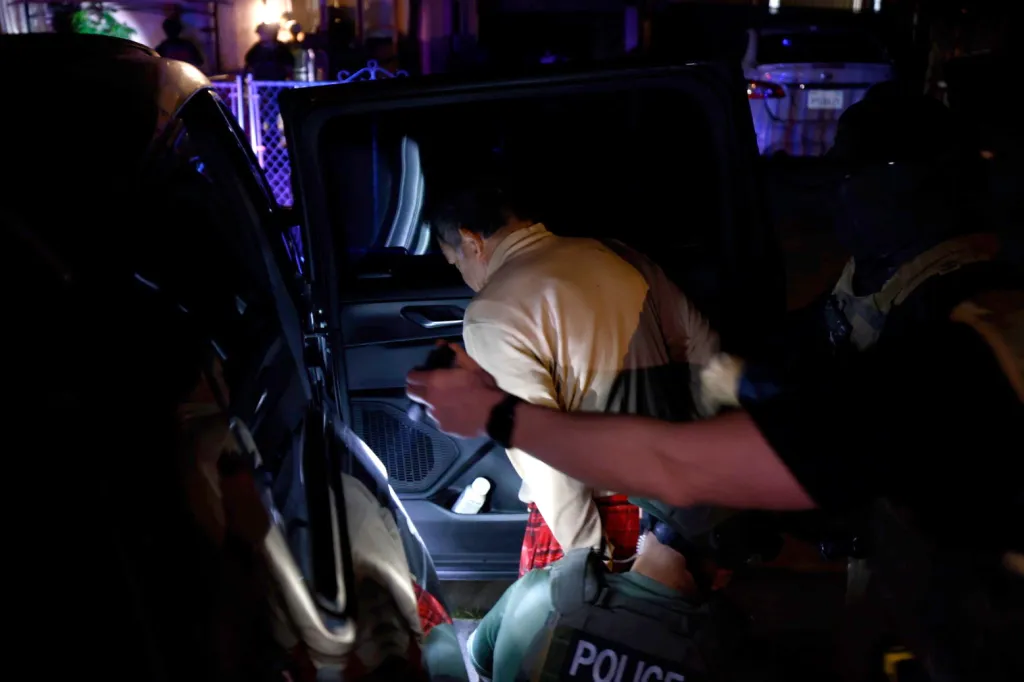 Police officers conducting a voter fraud raid in Los Angeles, California.