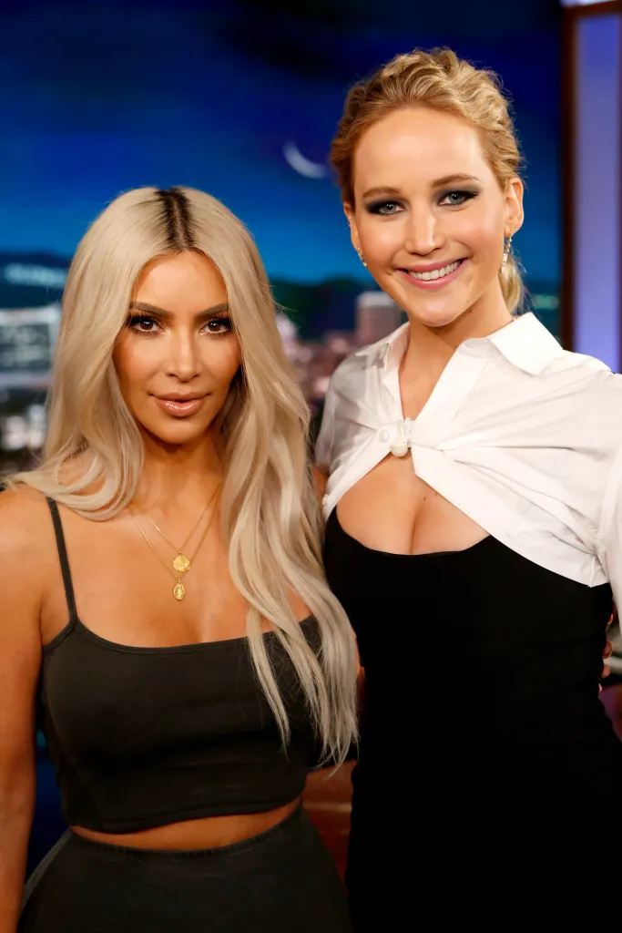 Kim Kardashian and Jennifer Lawrence pose together on Jimmy Kimmel Live.