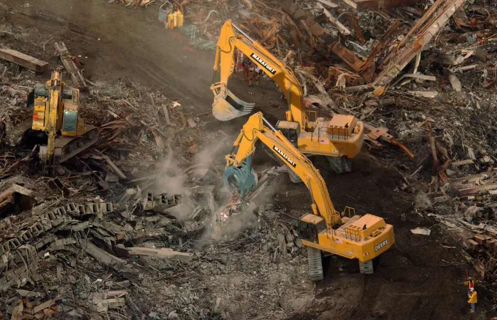 Heavy machinery working in the rubble at the World Trade Center site.
