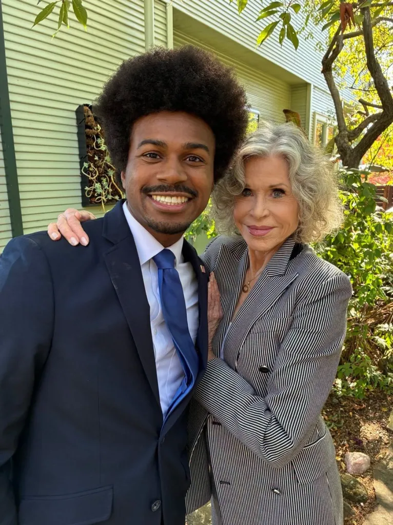 Jane Fonda and Justin J. Pearson standing together outside.
