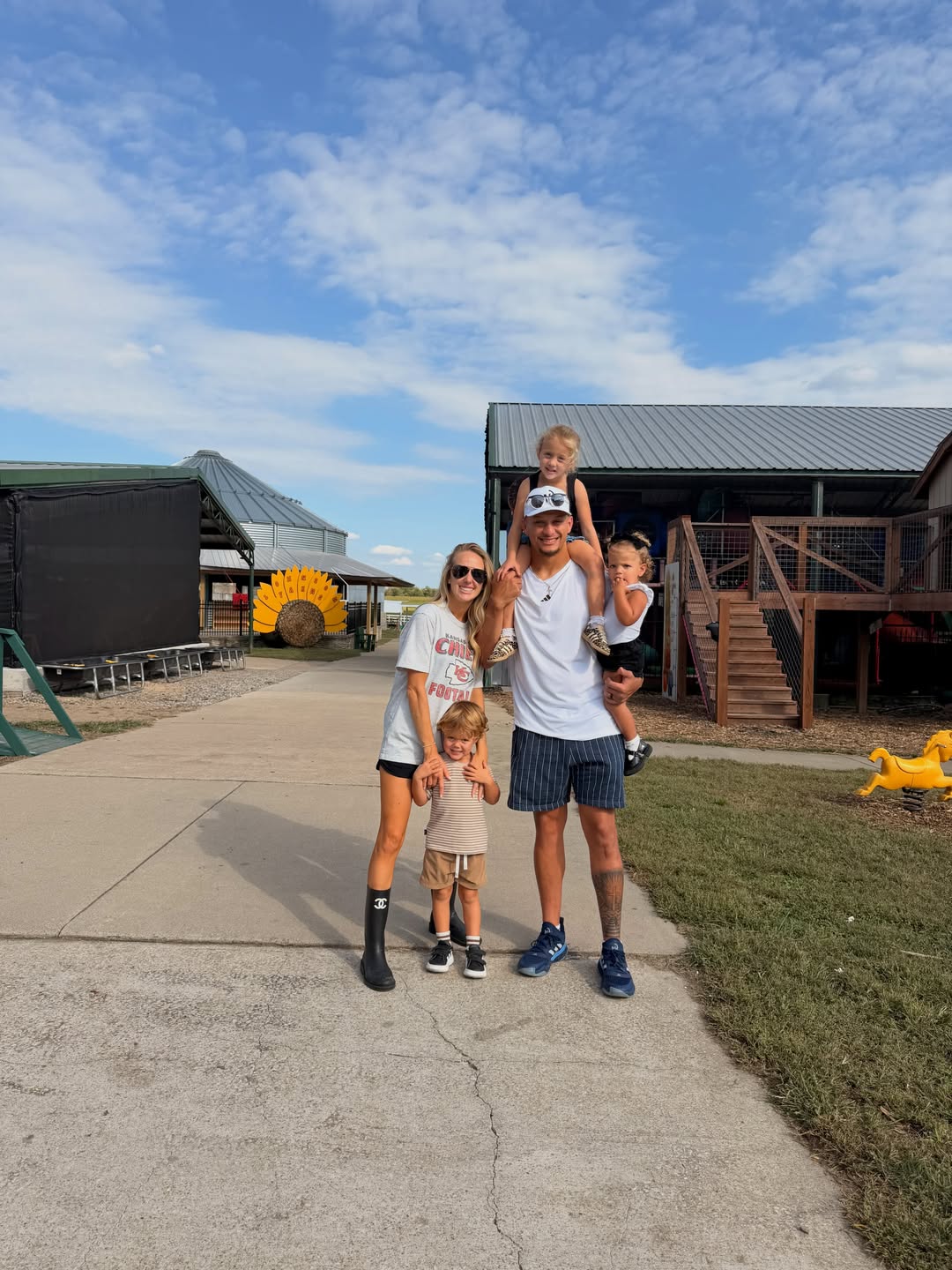 Patrick and Brittany Mahomes with their three children during an outing at a pumpkin patch.