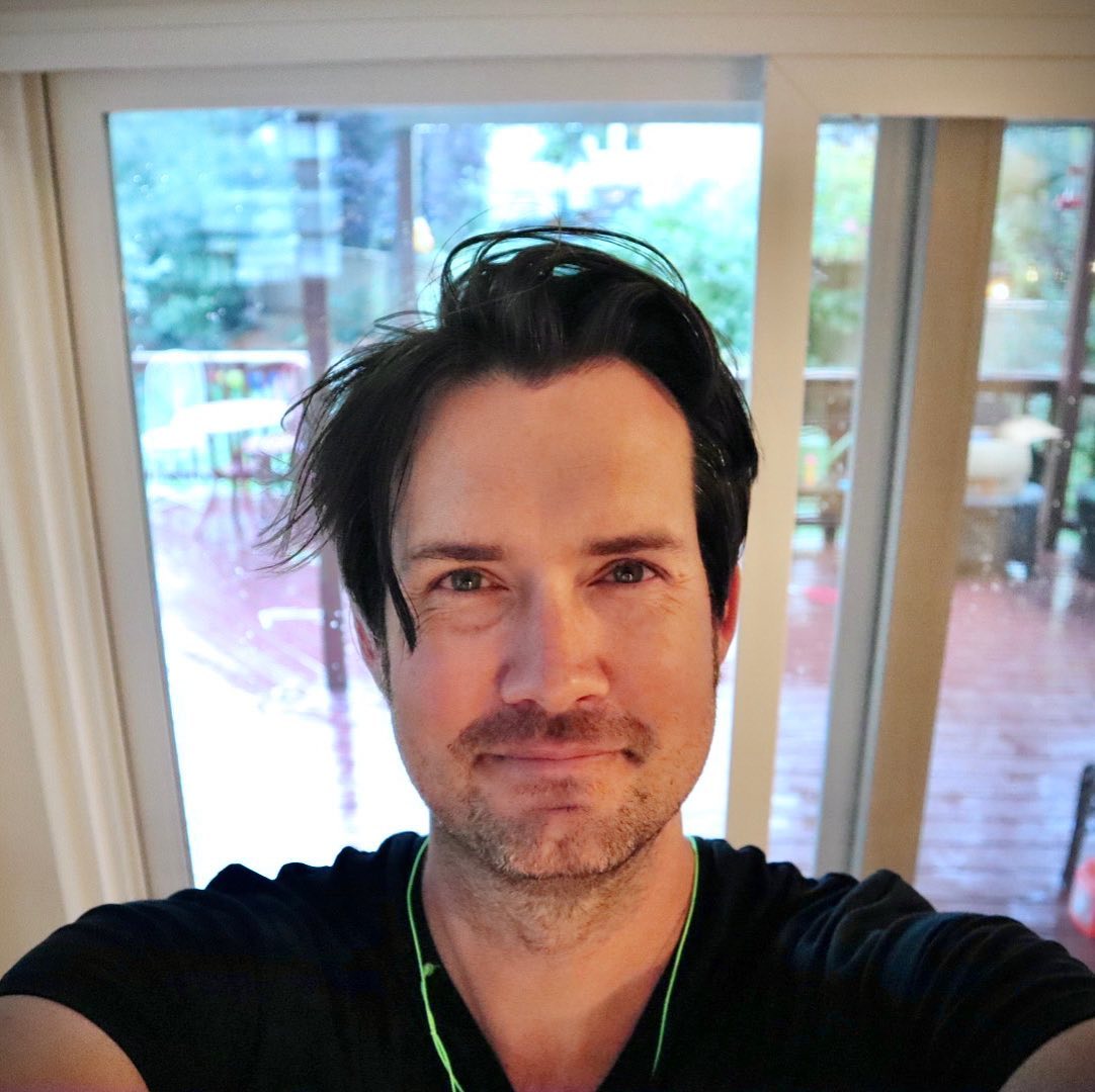 David Bowick taking a selfie indoors.
