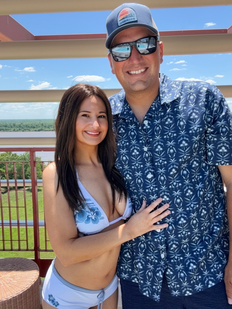 Gypsy Rose Blanchard and Ken Urker posing together outdoors on a balcony.