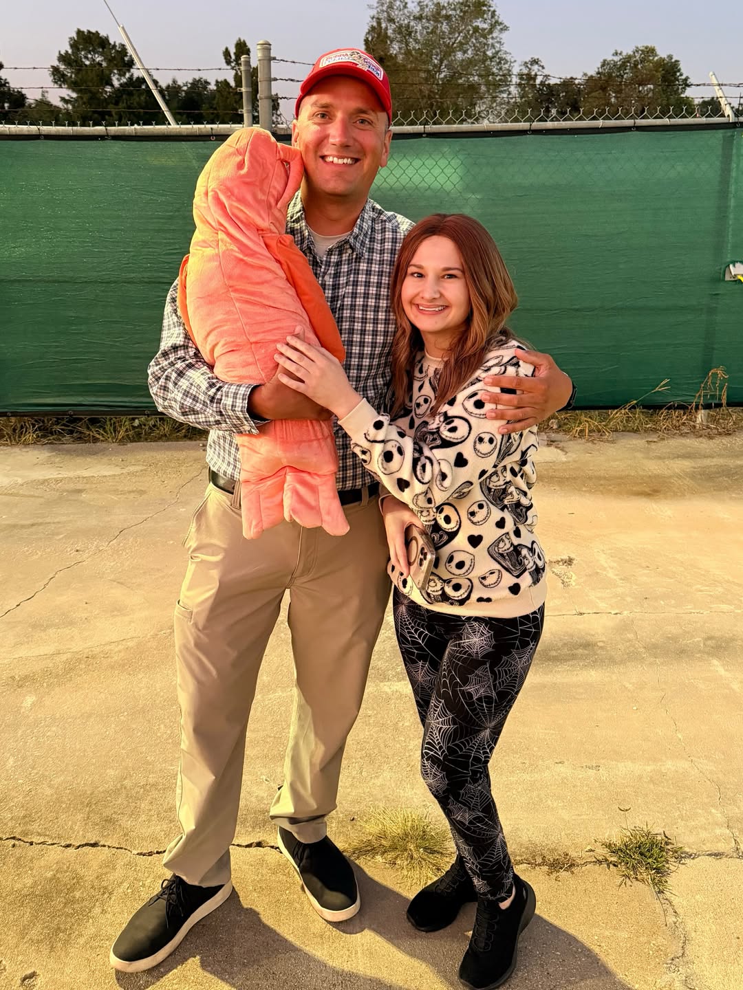 Gypsy Rose Blanchard and Ken Urker posing together outdoors.