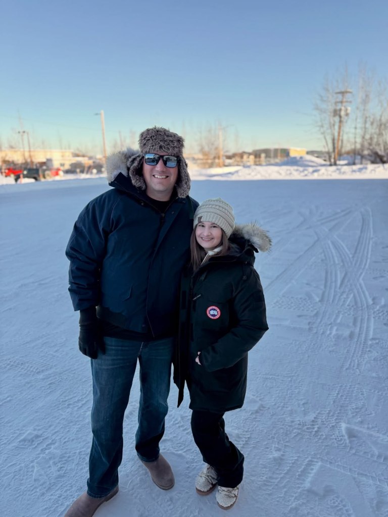 Gypsy Rose Blanchard and Ken Urker stand outdoors in a snowy landscape, wearing heavy winter coats.