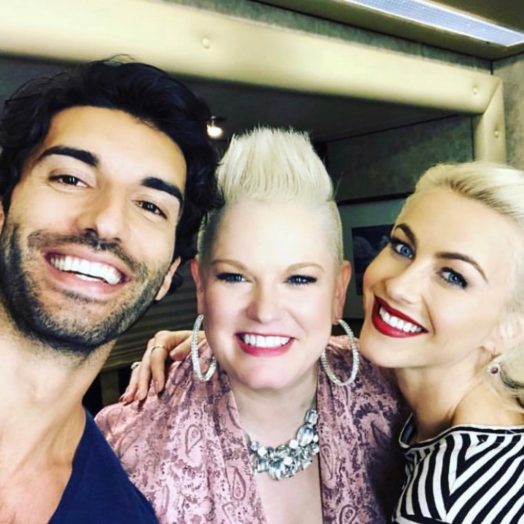 Justin Baldoni, Marinda Davis, and Julianne Hough smiling together.