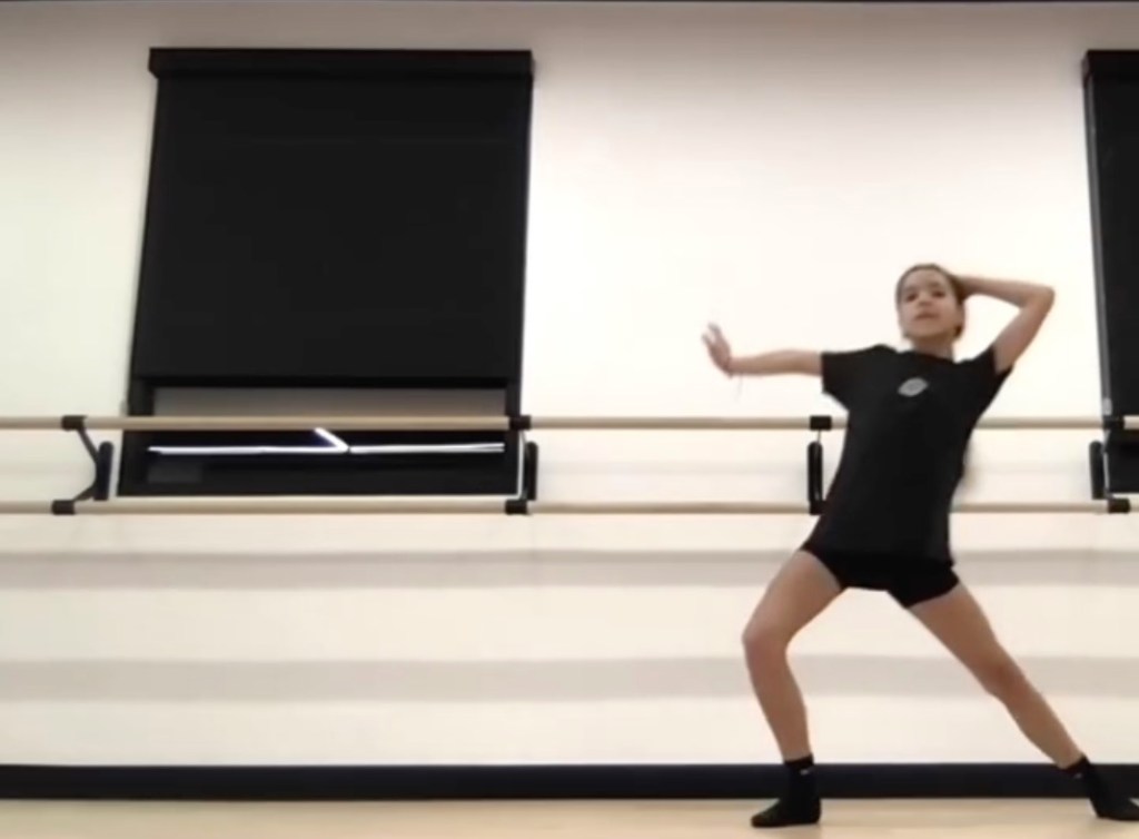 Fiona Lowe posing in a dance studio.