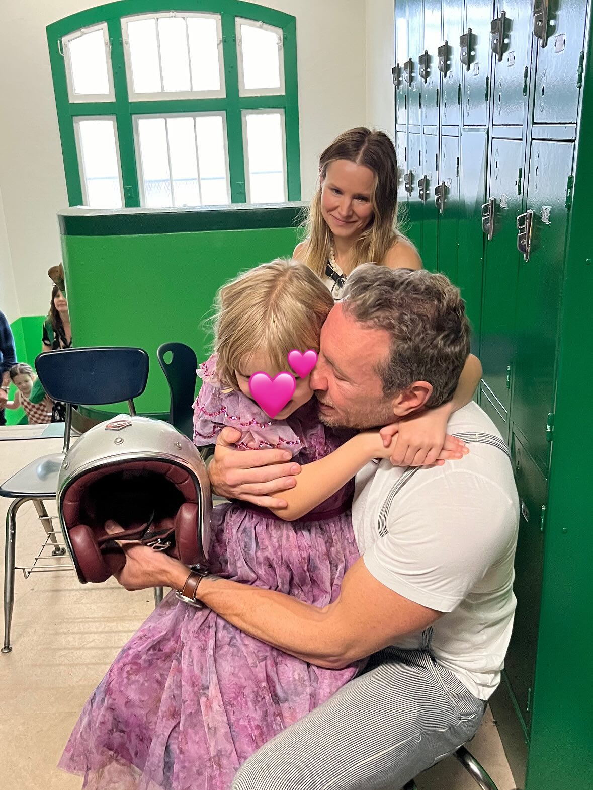 Kristen Bell and Dax Shepard with their daughter