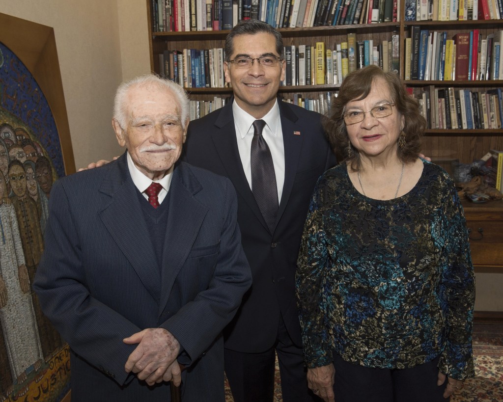 Xavier Becerra poses with his parents.