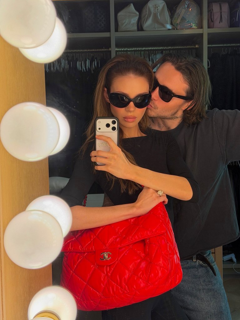 Nicola Peltz and Brooklyn Beckham take a mirror selfie together.