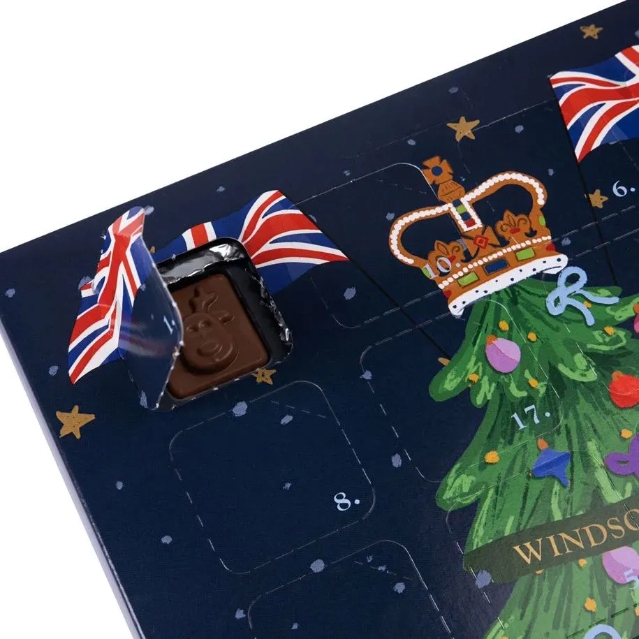 Advent Calendar from Buckingham Palace with a chocolate visible behind an opened door.