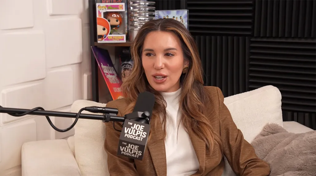 A guest on The Joe Vulpis Podcast speaking into a microphone.
